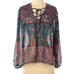 Francesca’s blue floral long sleeve top